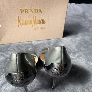 Prada/Neiman Marcus 100 anniversary patient leather silver pumps.